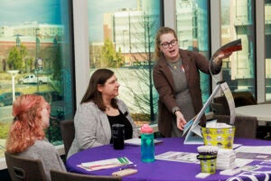 Librarians discuss education and library resources prior to breakout sessions at the ECU forum with the North Carolina Office of Strategic Partnerships, hosted by the College of Health and Human Performance.