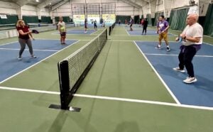 HHP faculty members enjoy playing pickleball together.