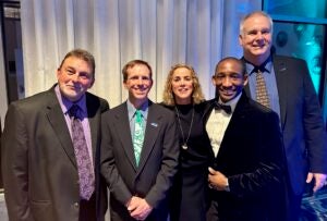 Professor Dr. Katie Flanagan, middle, pictured with fellow ECU athletic training alums Mike Guerrero, Eric Hall, Kevin King and Jim Bazluki.