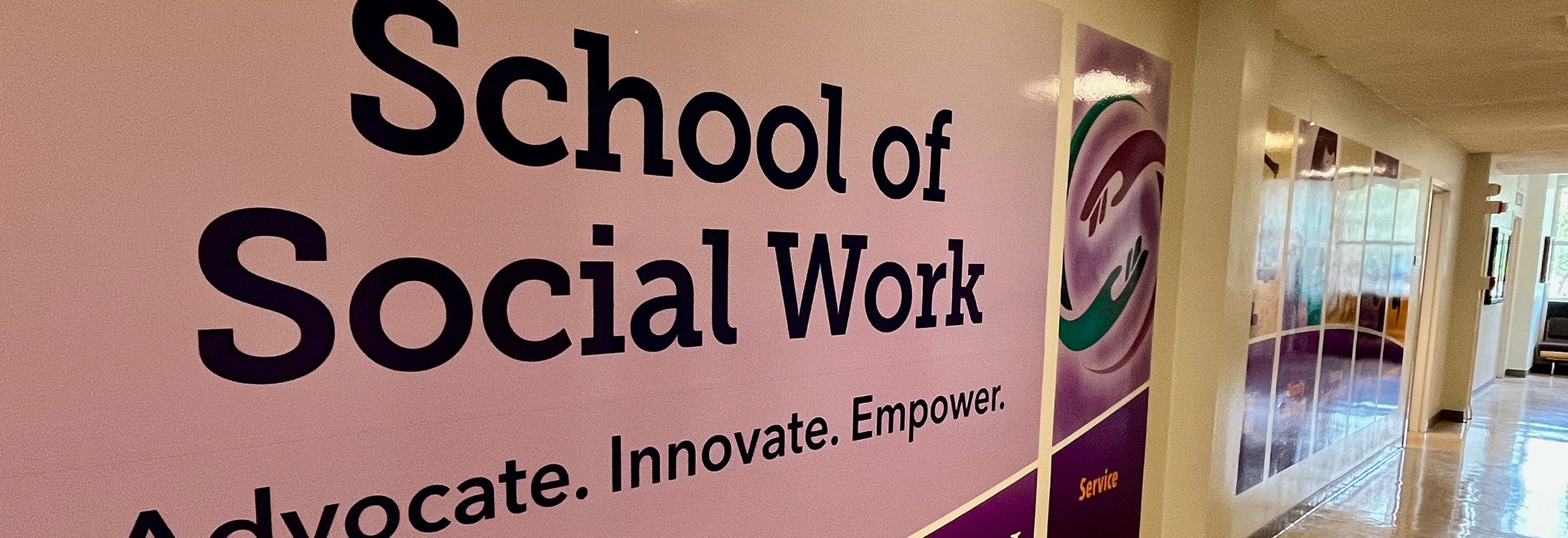 The ECU School of Social graphic in the Rivers Building. (Photo by Ronnie Woodward)