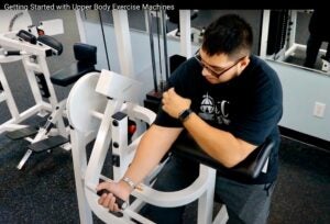 ECU student Joseph Ratte demonstrates equipment at Cypress Landing Fitness Center. (Capture from YouTube video)