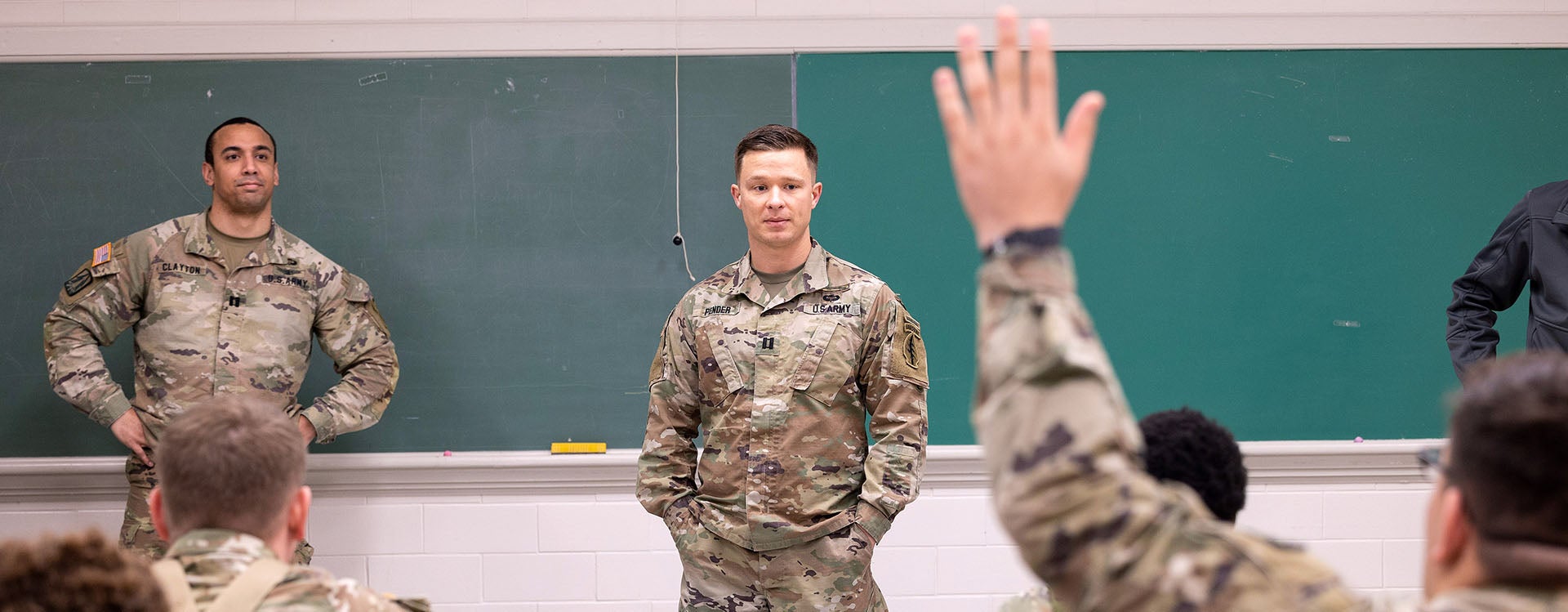112th Signal Battalion Special  Operations Airborne member Ausdin Pender speaks to a group of ROTC students at ECU. (Photo by Rhett Butler)