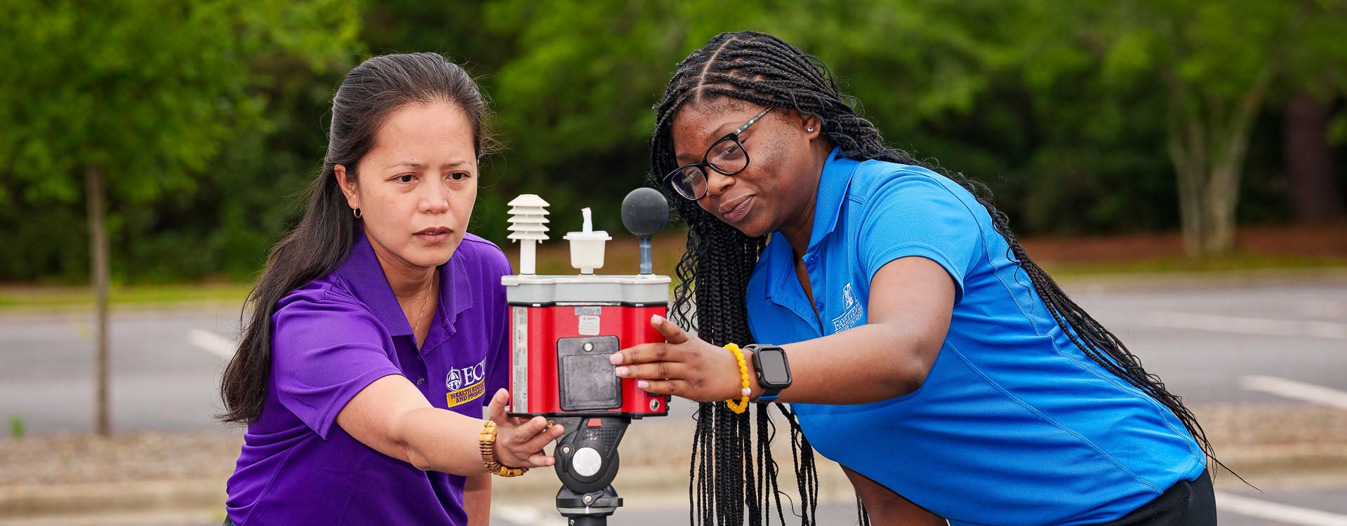 Jo Anne Balanay and FSU student setting up heat monitoring equipment. This is part of Glaxo Smith Kline Foundation funding for the ECU STEM Summer Immersion programs.